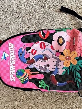 Sprayground Psychedelic Chex Skull Backpack in Pink & Black